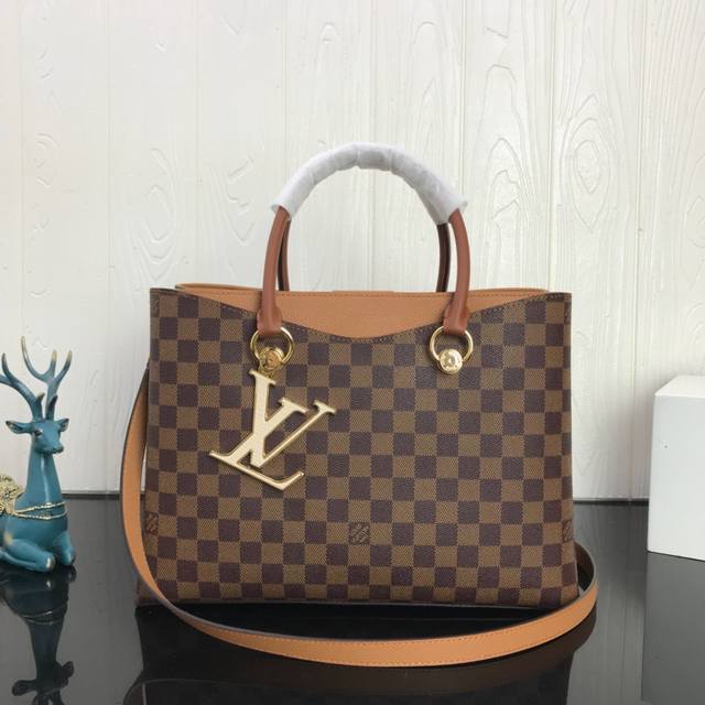 Lv Riverside 手袋n40052 N40050此款时尚雅致的lv Riverside手袋采用damier Ebene格纹帆布面料 拥有丰富的细节设计