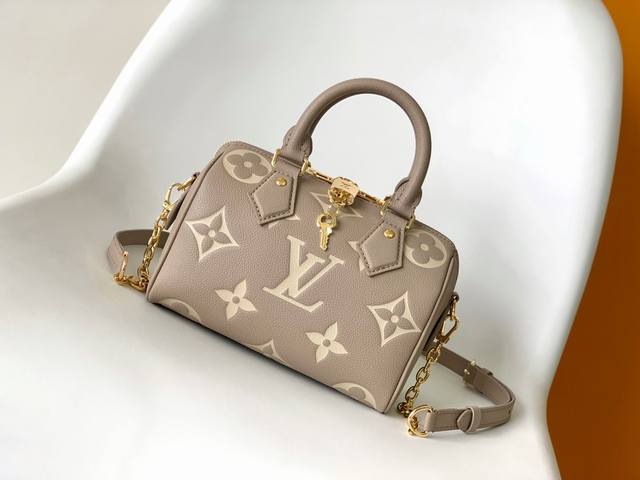 M46575灰色 M46397牛奶白 M58953黑色 M58958珠光蓝 由双色 Monogram Empreinte 皮革制成 饰有 Lv 标识与 Mono