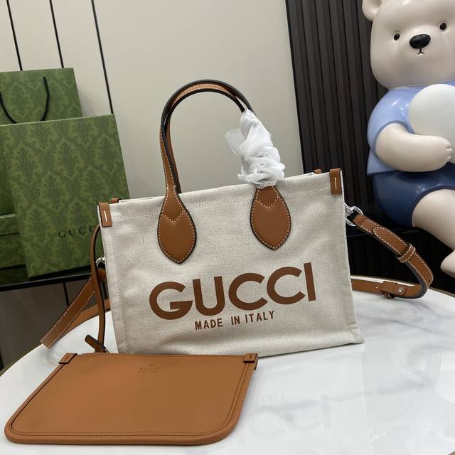 配全套原厂绿盒包装 Gg 新品 饰gucci印花迷你托特包 品牌标志性印花不断焕新演绎 生动彰显品牌别具一格的美学理念 作为2024早春系列的重要叙事元素 Gu