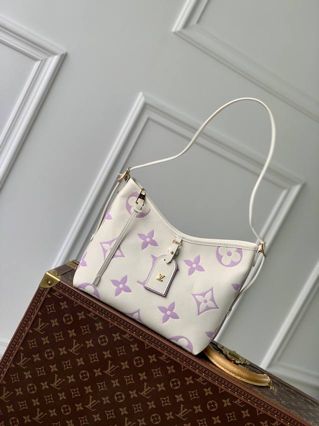 头层皮 顶级原单m46288丝印紫色 本款 Carryall 小号手袋取材 Monogram Empreinte 皮革，以粉彩色调释放雅致格调，搭配拉链开合、考