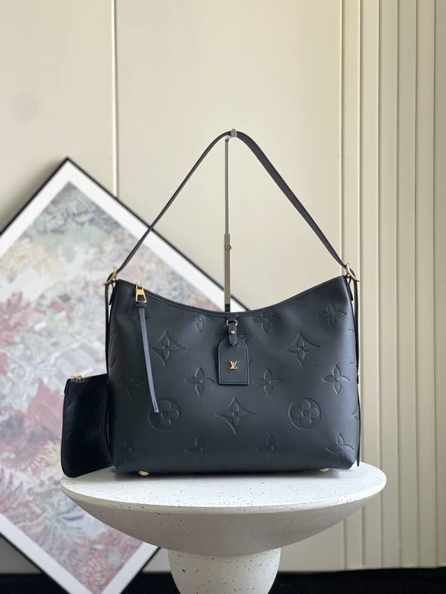 正品级 顶级原单复刻m46289黑压花 M46669 本款 Carryall 中号手袋取材 Monogram Empreinte 压纹皮革，以柔软质地贴合身形。